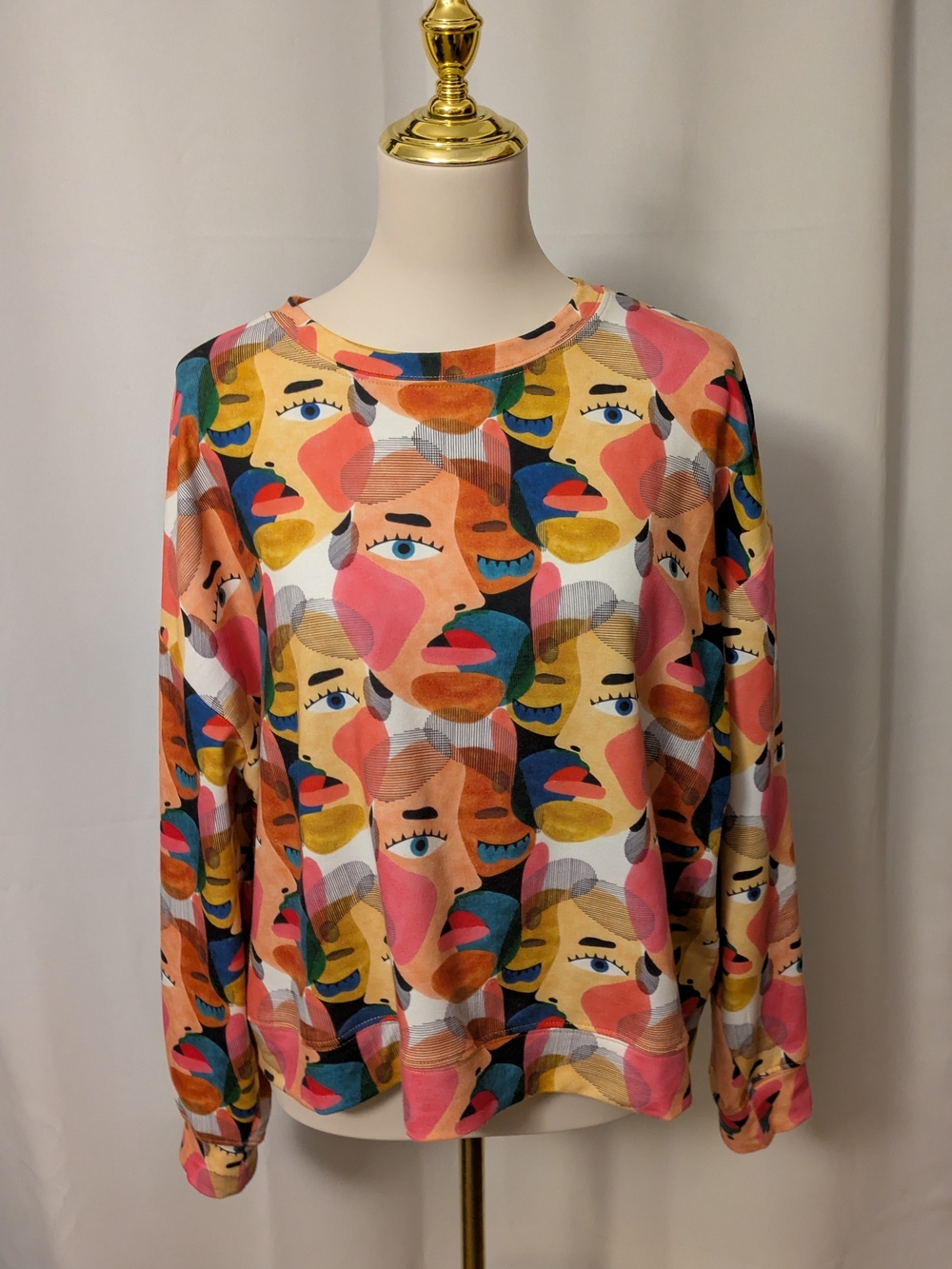 Isle Abstract Faces Long Sleeve Sweatshirt - Multicolor
